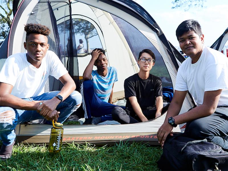 The featured image shows kids camping. 