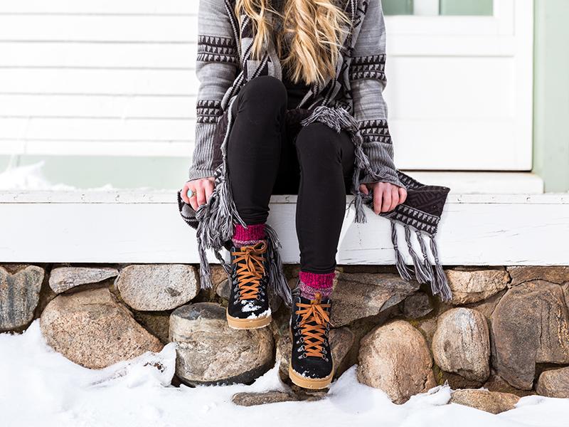 The featured image is of a woman wearing a pair of Forsake Waterproof Sneaker Boots.