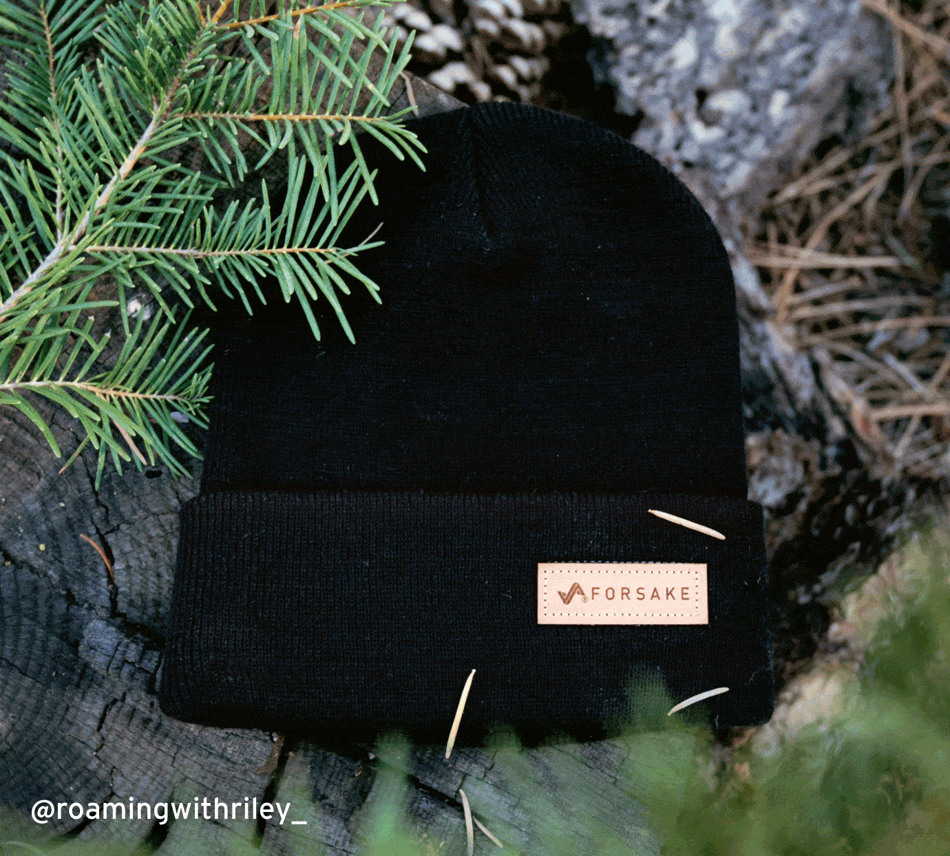$20 off plus a free beanie hat with every purchase. Image features the beanie hat in black.