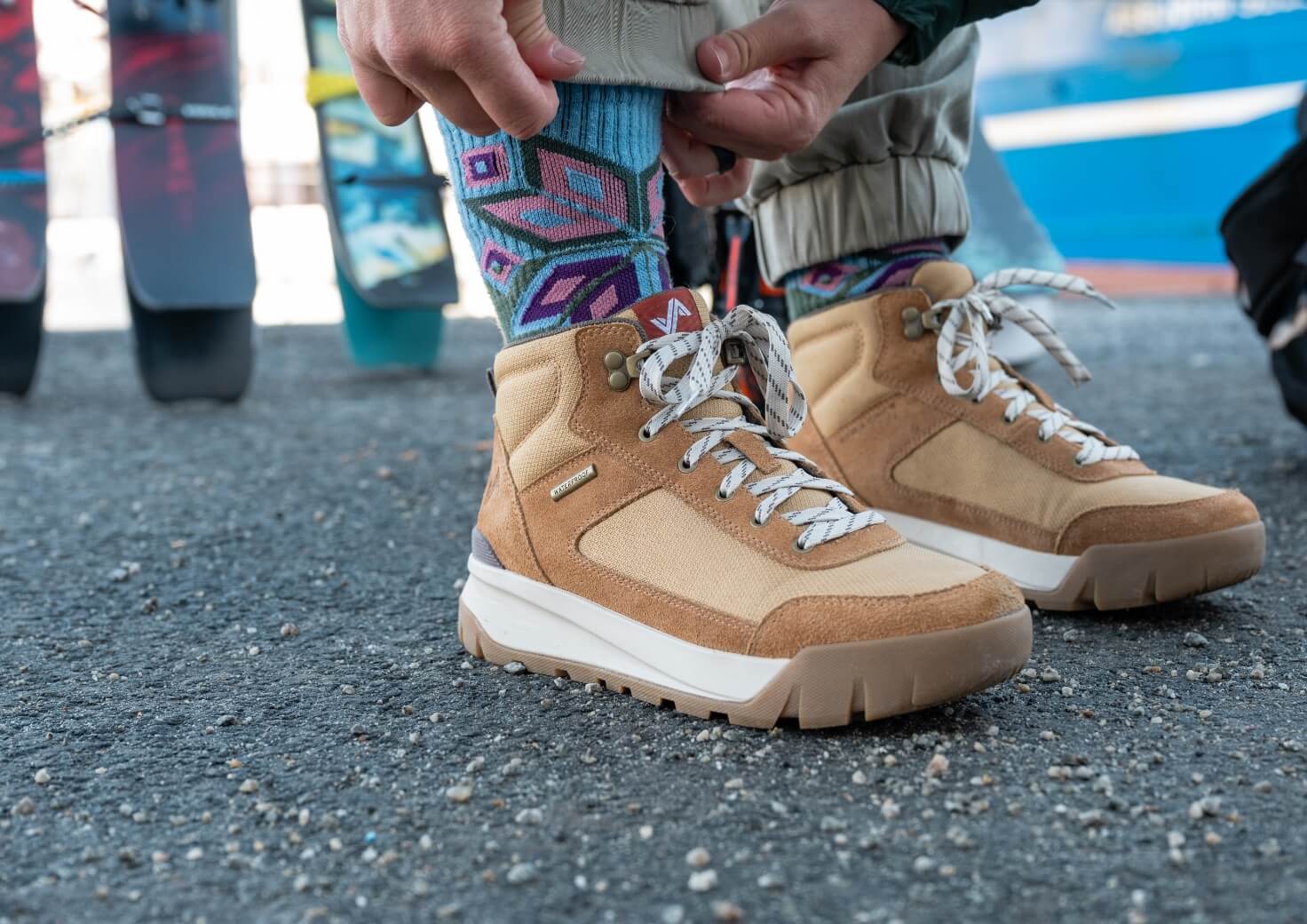 Shop Forsake women's featuring the Fifteen mid by a ski rack. 